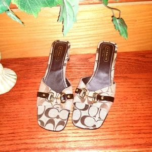 Never worn! Coach classic sandals.